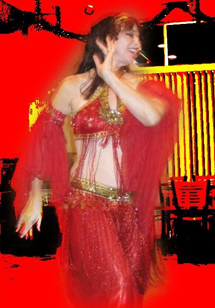 Anthea dancing in red costume