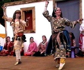 Prism
                    Dancers in beledi dresses